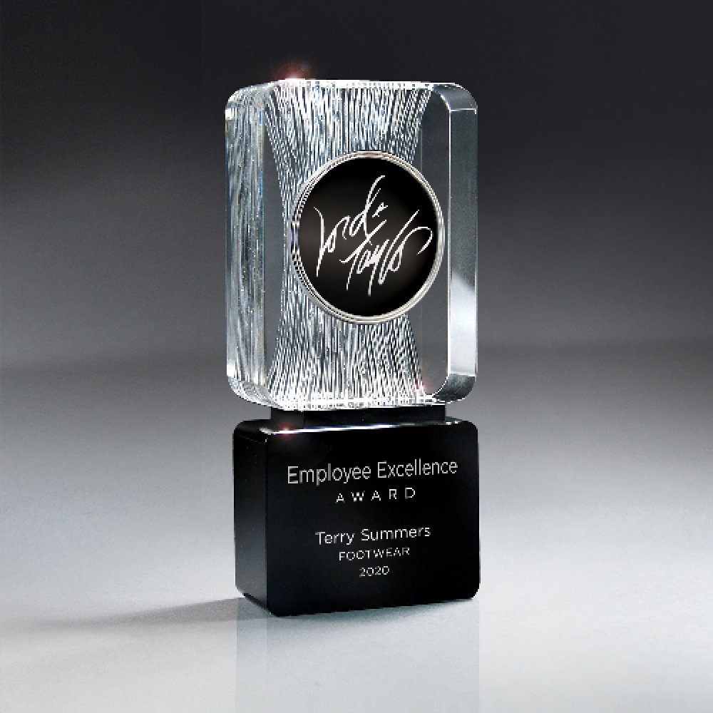 Carved Clear Crystal on Black Base with Logo Medallion — 6 1/2" x 3" x 1 1/4" Color(s): Clear, Black
